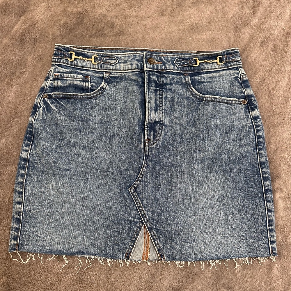 High waisted Express brand denim skirt with gold snaffle bit detail size 6